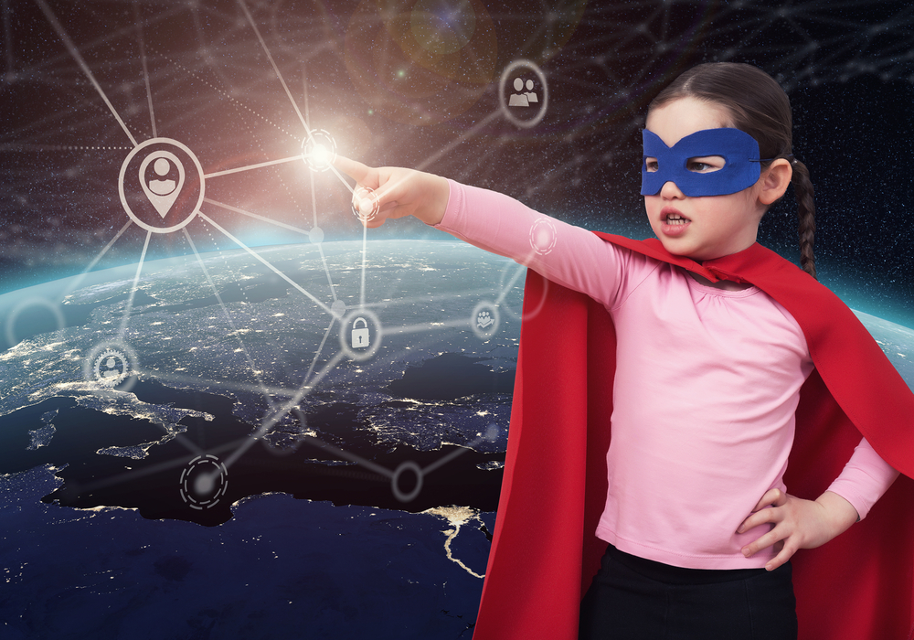 Little girl dressed up as super hero