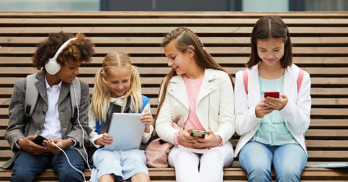 students on cell phone and tablet